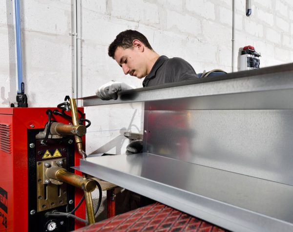 Caniveaux de séchage et ventilation pour stockage à plat